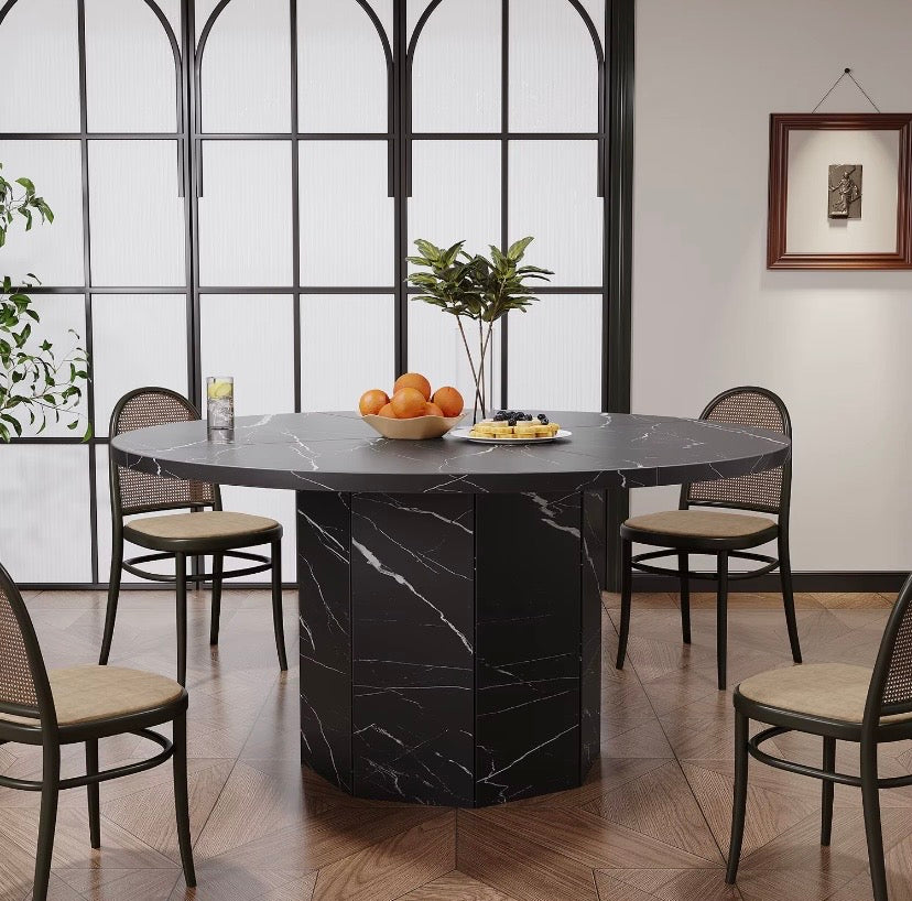Round black marble-effect dining table with wide pedestal base and tabletop