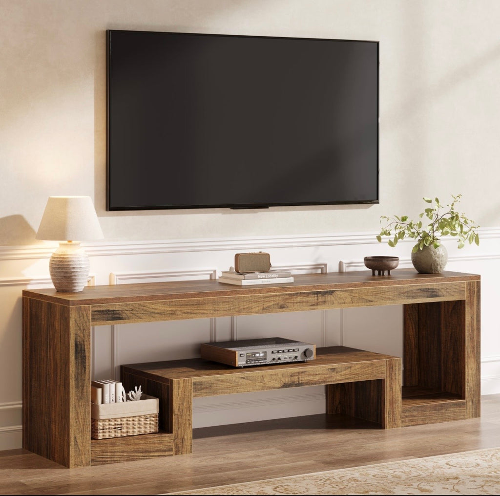 Rustic wood TV media console with two open shelves and center media shelf under TV