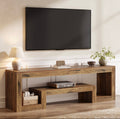 Rustic wood TV media console with two open shelves and center media shelf under TV