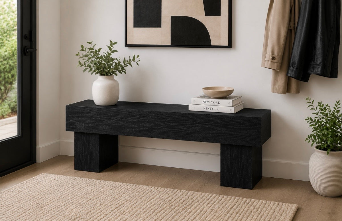 Dark wood low media console bench with central shelf surface and block legs
